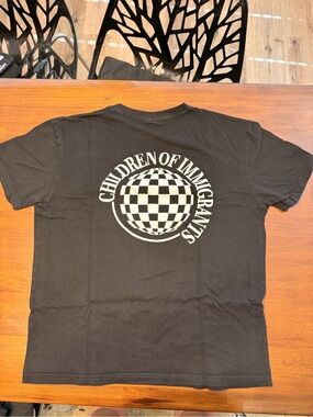 Black Tee with Small White Globe Graphic